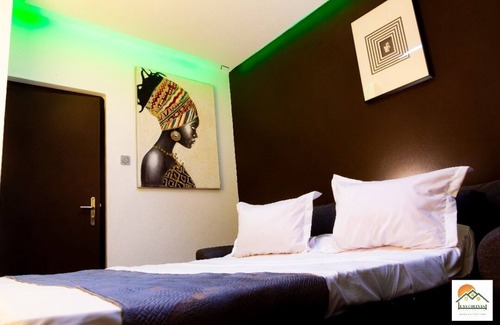 Yaounde Apartment | The Pandora: Secure and stylish studio with sofa bed, WiFi, smart TV and tub