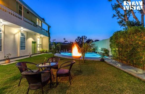 Amer Villa | The Pastel Courtyard with Pvt Pool & Garden at Jaipur by StayVista