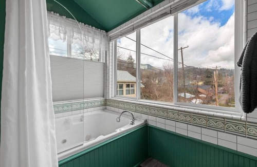 Historic Railroad District Hotel | The Peerless Hotel | Honeymoon Suite #7 | Private Jacuzzi | Mountain Views