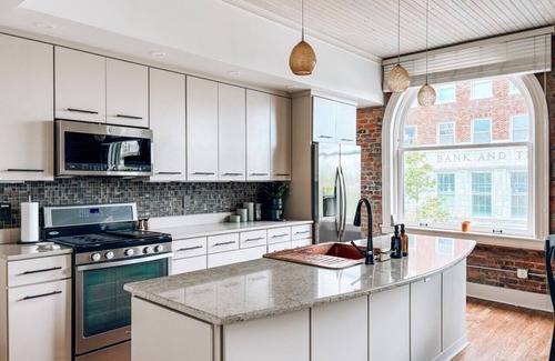 Downtown Greensboro Apartment | The Rooftop Nest - Downtown, Playstation 5!, Pet Friendly, Laundry, Natural Light