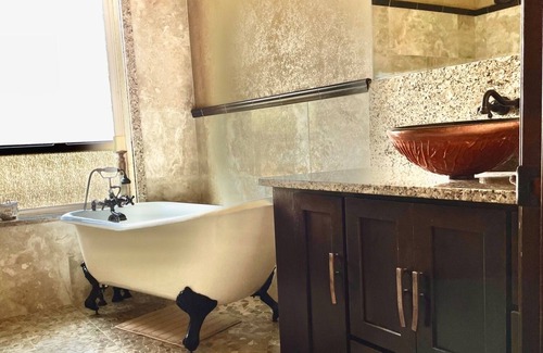 Tri-Cities Ski Chalet | The Santina Suite a Tuscany inspired space providing a relaxing retreat.