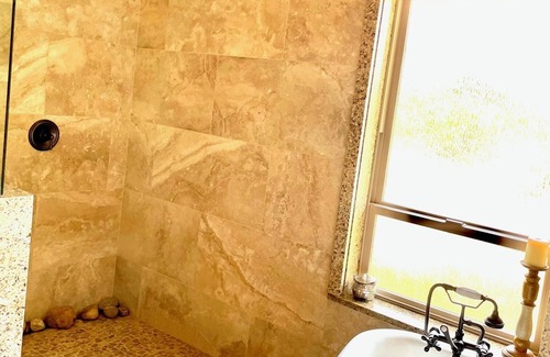 Tri-Cities Ski Chalet | The Santina Suite a Tuscany inspired space providing a relaxing retreat.