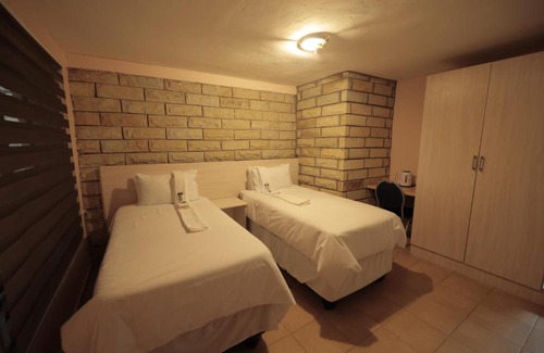 Teyateyaneng House | The Stone Guest House
