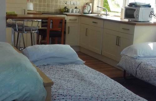 Treen Ski Chalet | The Studio is close to The Logan Rock Inn. Minack Theatre. Pedn Vounder beach.