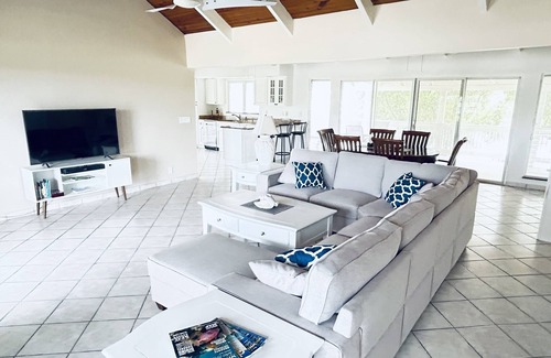 Discovery Bay House | The Flamingo House, Open & Breezy Island Home, Minutes From the Beach