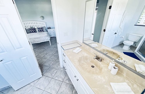 Discovery Bay House | The Flamingo House, Open & Breezy Island Home, Minutes From the Beach