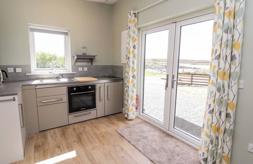 North Uist Cottage | THE WHEELHOUSE, romantic, country holiday cottage in Balivanich