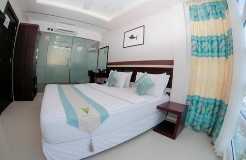 Hulhumale House | The White Harp Beach Hotel