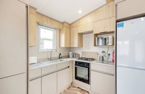 Kirkcudbright House | This 2 bedroom caravan sleeps 4 people in one double and one twin bedroom.