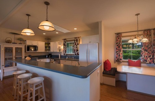 Hanalei House | This beautiful beachfront Hanalei Bay home is located steps from the sand