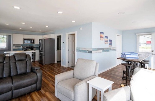 Mears House | This charming vacation home sits directly on Lake Michigan and it delivers!