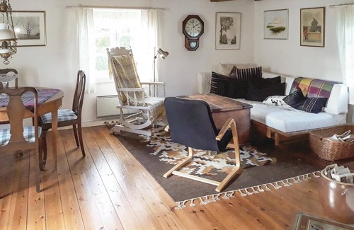 Mariannelund House | This cozy red house awaits you in Mariannelund.