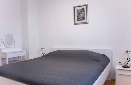 Gondolici Apartment | This functionally furnished apartment is located on a hill with a beautiful view of the sea and the