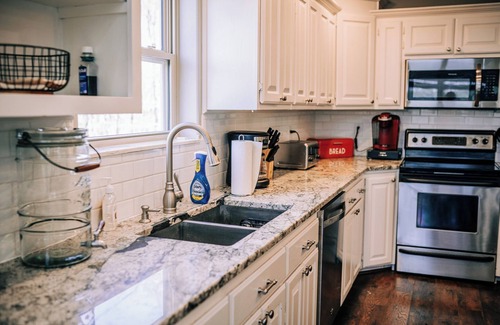 Jay Resort | This home accommodates multiple families sleeping comfortably up to 14 people.