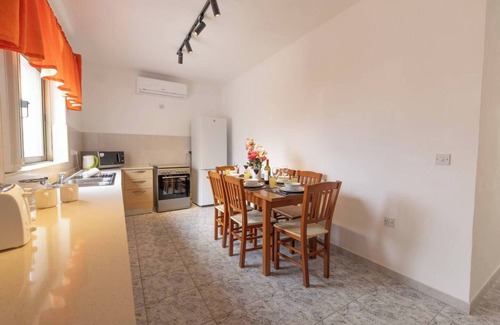 Santa Maria Estate House | This house is a 4 bedroom(s), 2 bathrooms, located in Il-Mellieħa, null.