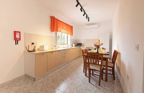 Santa Maria Estate House | This house is a 4 bedroom(s), 2 bathrooms, located in Il-Mellieħa, null.