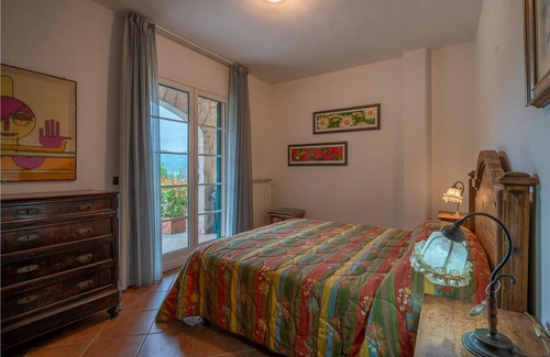 Garlenda House | This lovely semi-detached house with private pool is located just 8 km from the sandy beaches of Ala