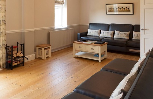 Darlington Cottage | This property is in a stunning location, it boasts a private hot tub and games rooms.
