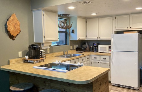 Kingston Cabin | This relaxing cabin is cozy and secluded with private pond and fishing dock