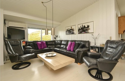 Rindby Strand House | This renovated cottage has among other things a beautiful kitchen with skylight, window front to the