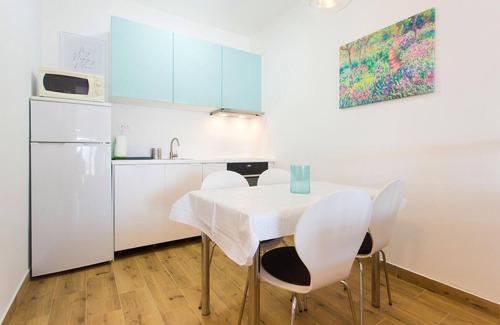 Stobrec Apartment | This simply furnished studio apartment with a shared barbecue and garden is located on the second fl