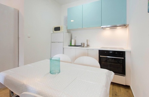 Stobrec Apartment | This simply furnished studio apartment with a shared barbecue and garden is located on the second fl