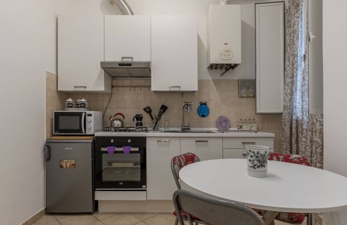Salario Apartment | This spacious 55sqm apartment with four bedrooms is able to accommodate up to 8 people. Located on the first floor (with elevator not suitable for disabled) of a restored period building, the apartment overlooks the private park of Villa Albani, one of t