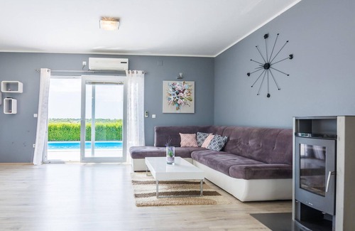 Policnik House | This spacious vacation home with pool is suitable for families or friends who want to enjoy nature,