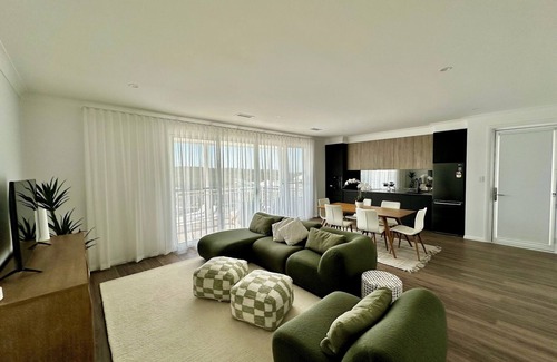 Moonee House | This stylish place to stay is perfect, elegantly finished with ample space.