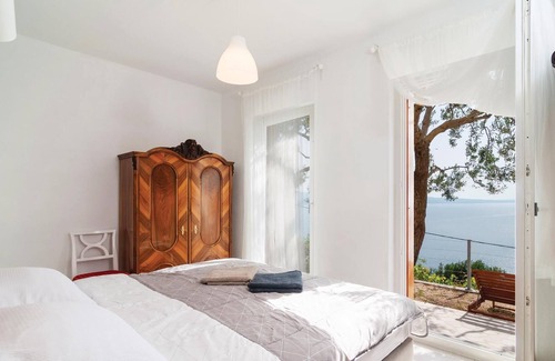 Borak House | This well-equipped vacation home with panoramic sea view is located in the village of Borak, above O