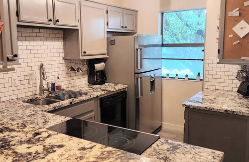 Barton Hills Condo | Three balconies steps from Barton Springs Pool and Zilker Park