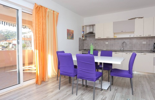Seget Vranjica Apartment | Three bedroom apartment with terrace and sea view Seget Vranjica, Trogir (A-17989-a)
