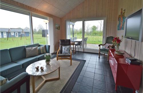 Krejbjerg House | Three-Bedroom Holiday Home With A Fireplace In Ejstrupholm