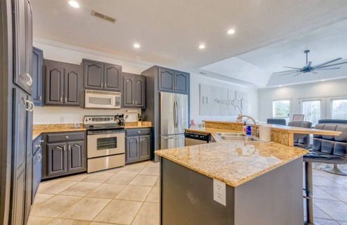 Muscle Shoals House | Three Level Waterfront Condo with Boat Slip near RTJ Golf Course. Two Kings.