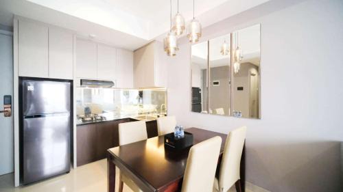 Surabaya Apartment | Tidy and Spacious 2BR at Grand Sungkono Lagoon Apartment By Travelio