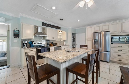Cocoa Isles House | TIKI BLUE: 5 BedRm Beach House: Heated Pool + Hot Tub + Tiki Bar