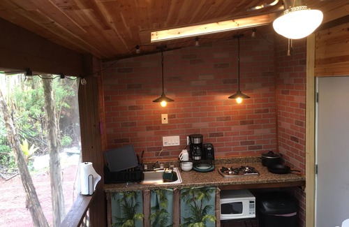 Fern Forest Cabin | tiny home 1- with kitchen equipped with essentials near at the Volcano Park!