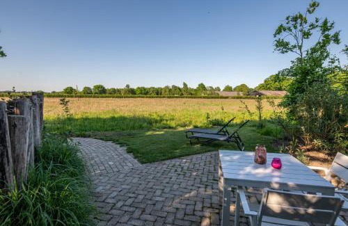 Stieltjeskanaal Apartment | Tiny Wellnesslodge Wulp met sauna