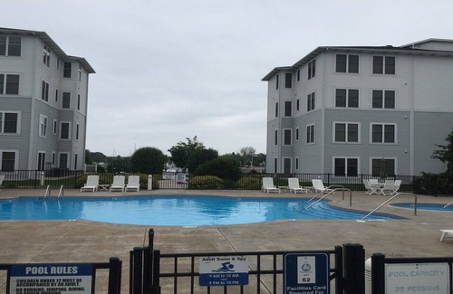 Ludington Condo | Toes in the Sand at One Ludington Place: Pool/Hot Tub/Close to beach!!