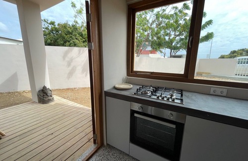 Jan Thiel House | Toko Ti: stylish tropical house with large veranda & saltwater pool is relaxation