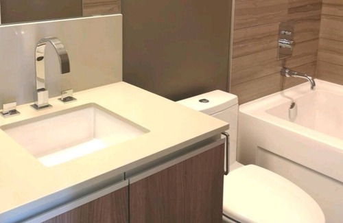 Victoria Park Apartment | Top floor condo that is your ideal stay for Stampede