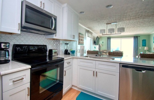 Kure Beach Condo | Top Floor Oceanfront Condo with elevator in Ocean Dunes Indoor/Outdoor Pools