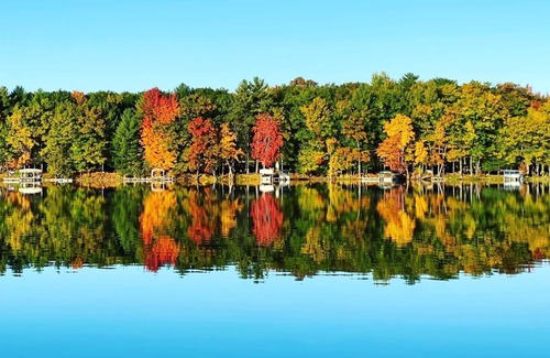 Clam River Condo | Torch Lake, a Short Boat Ride Away from this Clam Lake Efficiency Condo