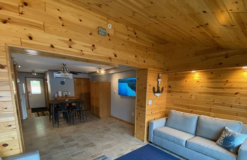Clam River Condo | Torch Lake, a Short Boat Ride Away from this Clam Lake Efficiency Condo