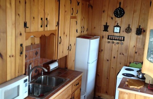 Rapid City Cabin | Torch Lake Dream Cottage