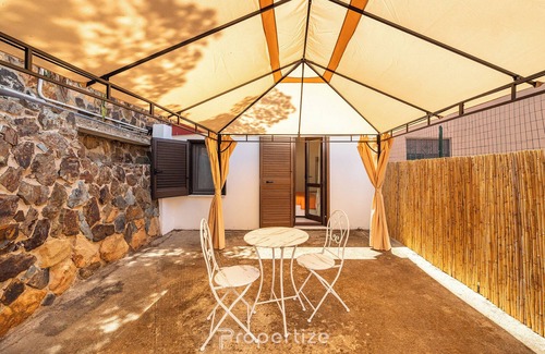 Poggio dei Pini Apartment | Tra I Verdi Pini by Propertize | garden e patio