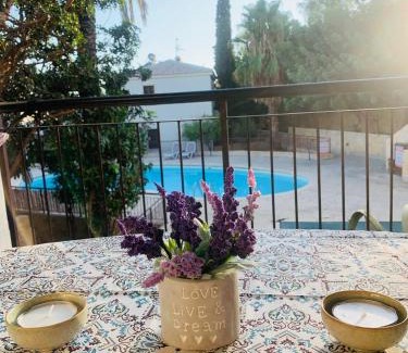 Mazotos Apartment | Tranquil Poolside apartment with stunning views