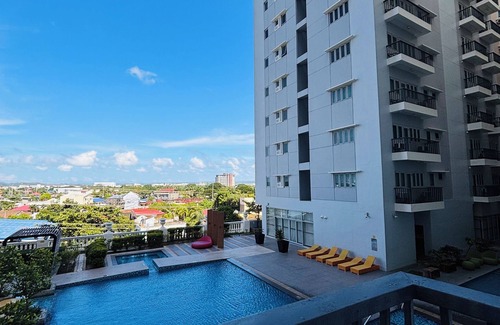 Iloilo Condo | Tranquil Poolside Balcony