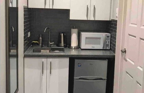 Newtown Apartment | Tranquility Hotel Suite RD, walking distance to the QPS, Ariapita Ave, & EV Zoo,