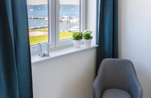 Schwerin Apartment | Traumhaftes Appartment mit Seeblick, Sauna, Kamin, Dachterrasse und Stadtnähe